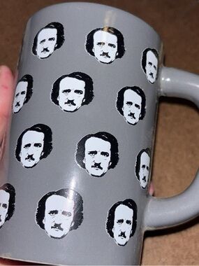 Novelty Grey Ceramic Mug with Repeating Face Pattern Edgar Allen Pie collection